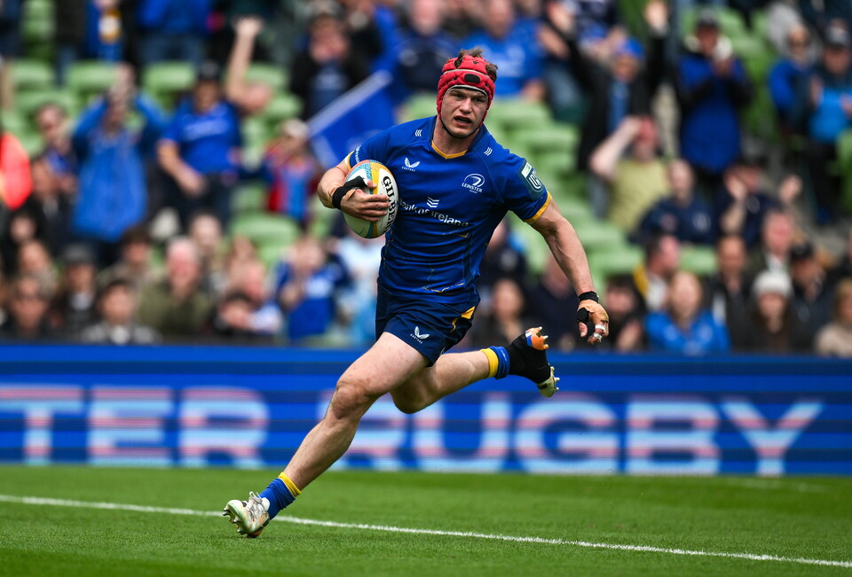 Josh van der Flier runs in a try against the Ospreys