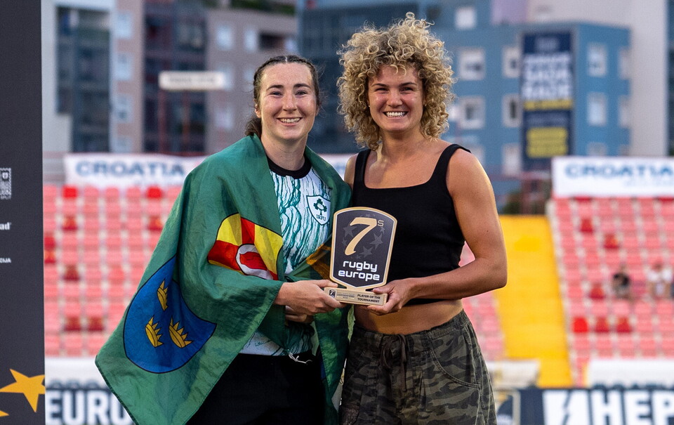 Eve Higgins receives her award from Ellie Kildunne