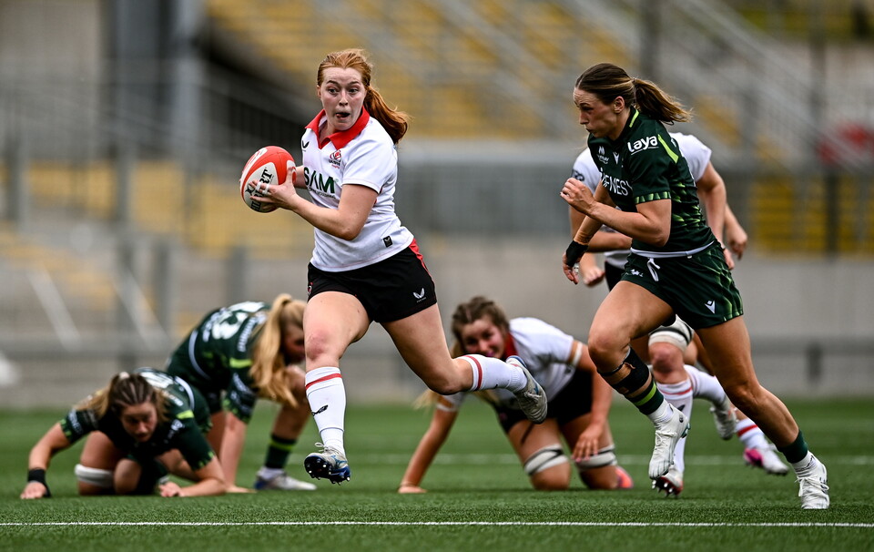Ulster centre Lucy Thompson is chased by Connacht's Anna McGann
