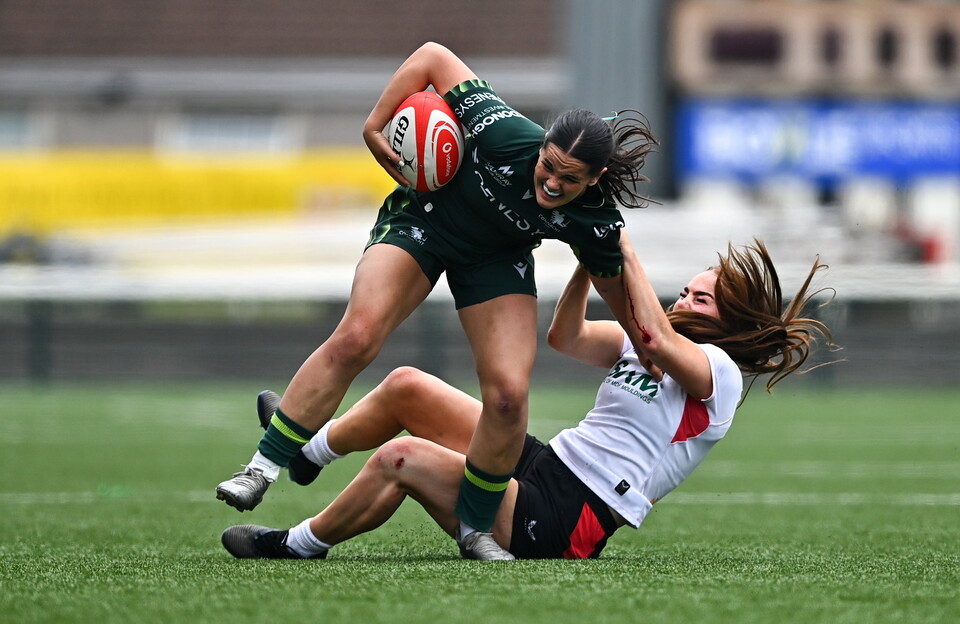 Clara Barrett in action against Ulster try scorer Niamh Marley