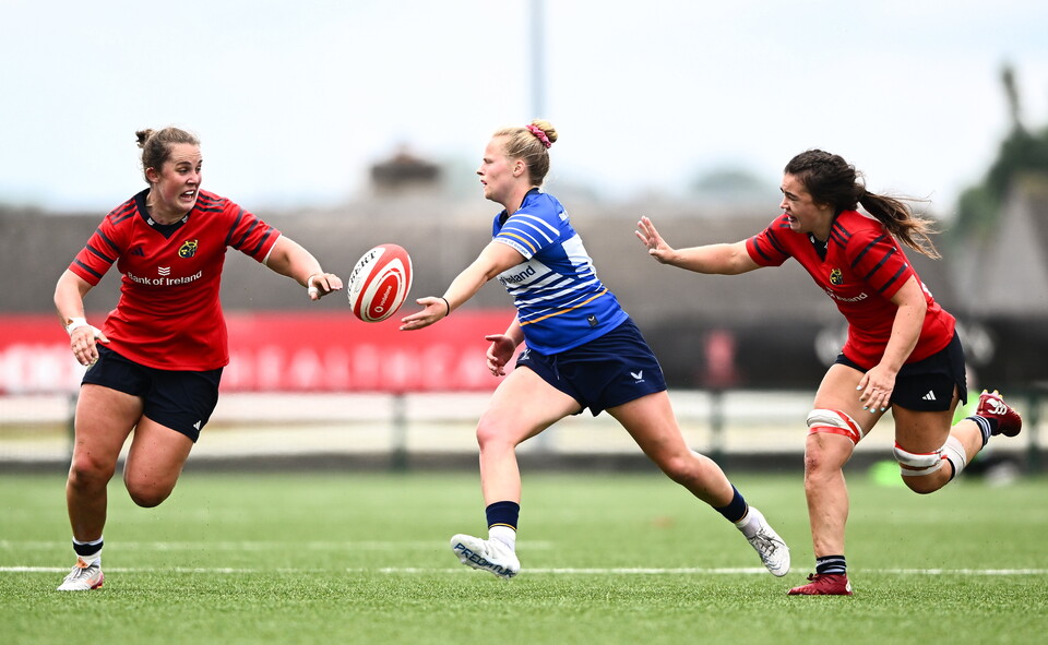 Dannah O'Brien tries to offload as Enya Breen and Maeve Óg O’Leary close in