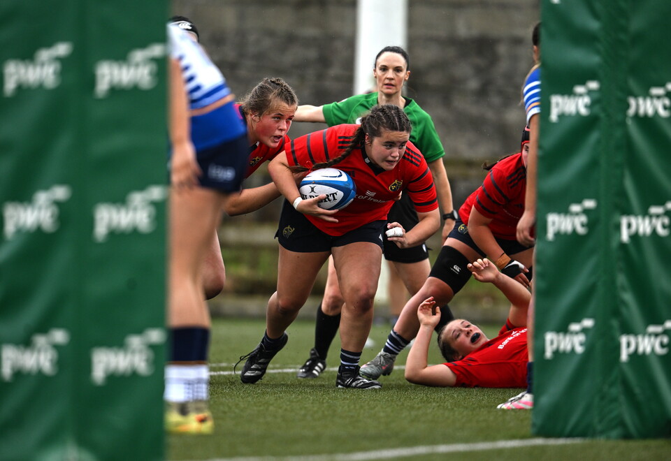 Munster U-18 prop Charlotte Deegan drives towards the try-line