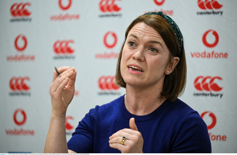 An image of Lynne Cantwell speaking at a press conference