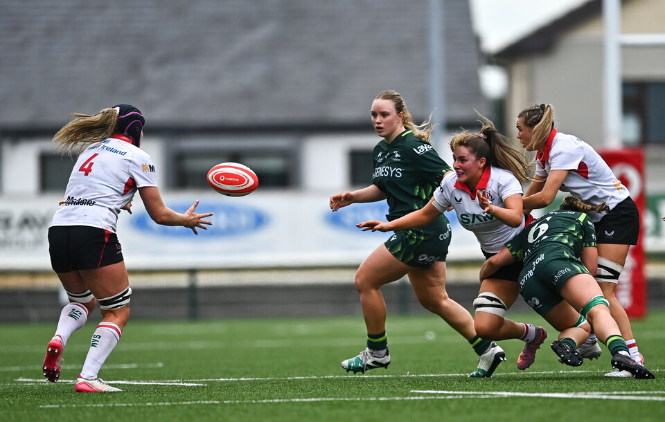 Moya Hill connects with her Ulster team-mate Fiona Tuite-O'Sullivan