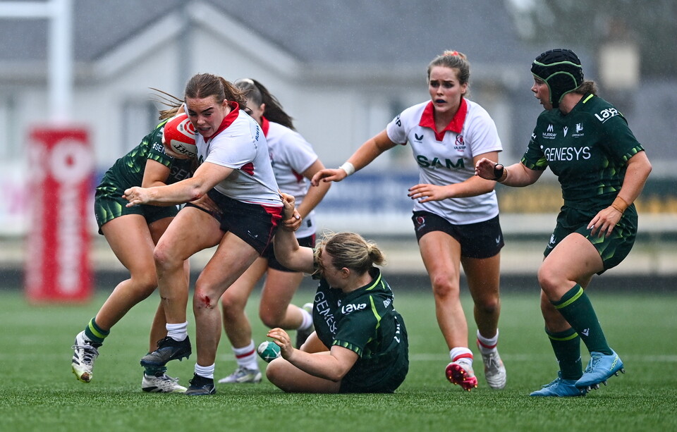 Síofra Hession and Lily Morris get to grips with Ulster's Niamh Marley