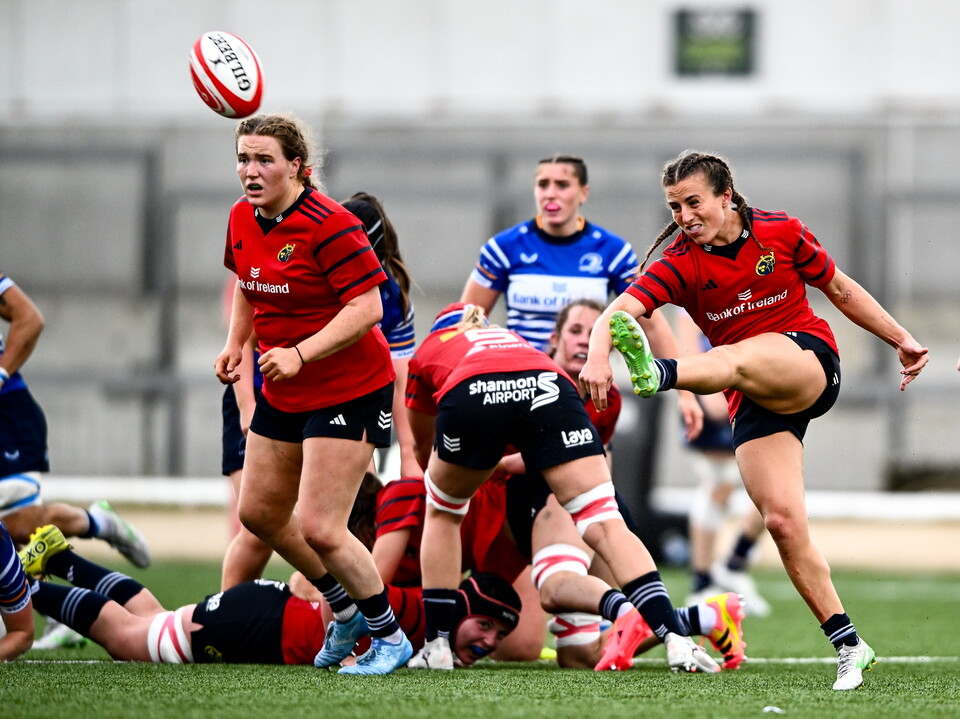 Munster's Emily Lane launches a kick downfield
