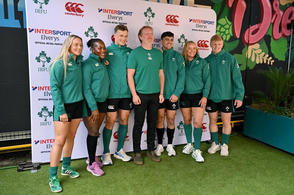 The Ireland players with traditional musician Cormac Begley