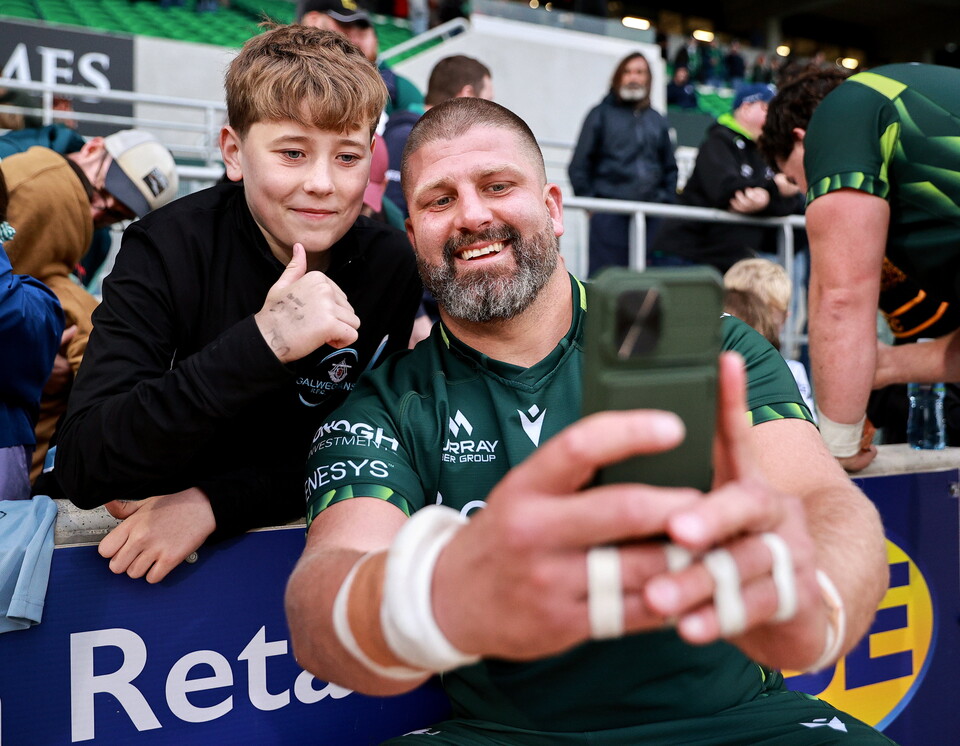 Francois van Wyk takes a selfie with a Connacht fan