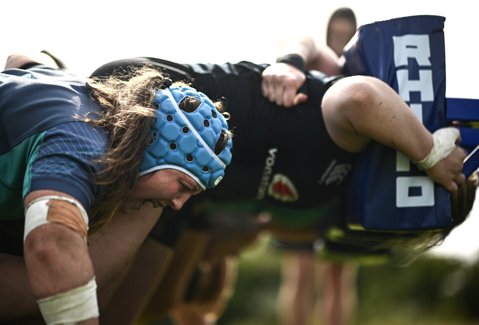 Brittany Hogan scrummages behind Sadhbh McGrath