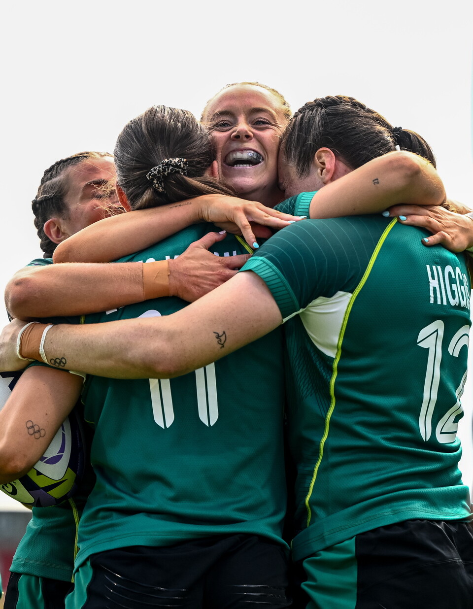 The Ireland players celebrate with try scorer Vicky Elmes Kinlan