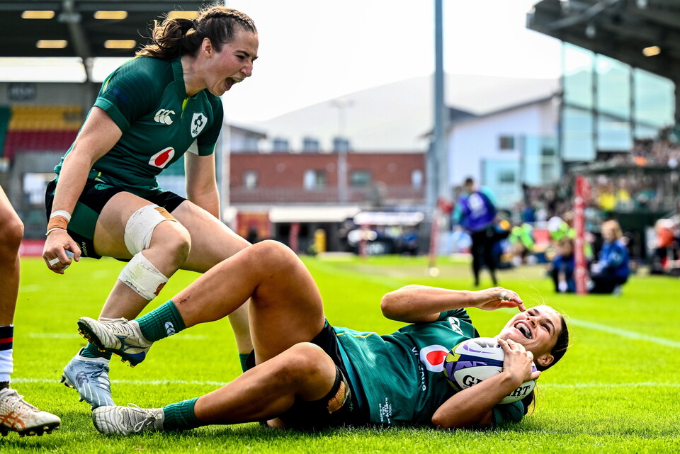 Eve Higgins reacts as Vicky Elmes Kinlan scores a try