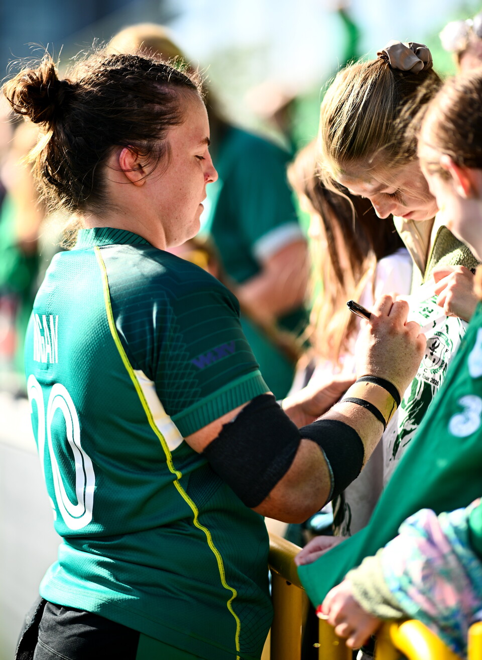 Brittany Hogan signs autographs after Ireland's clash with the USA