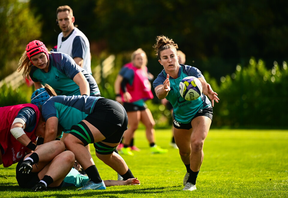 Emily Lane passes the ball away from a ruck