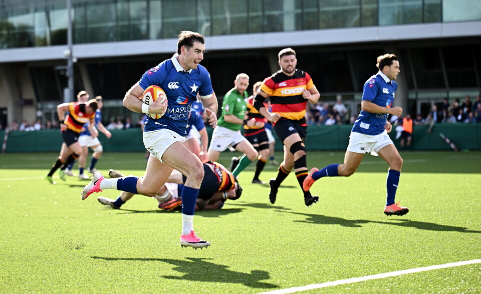 Ruairi Shields runs in a try for St. Mary's College