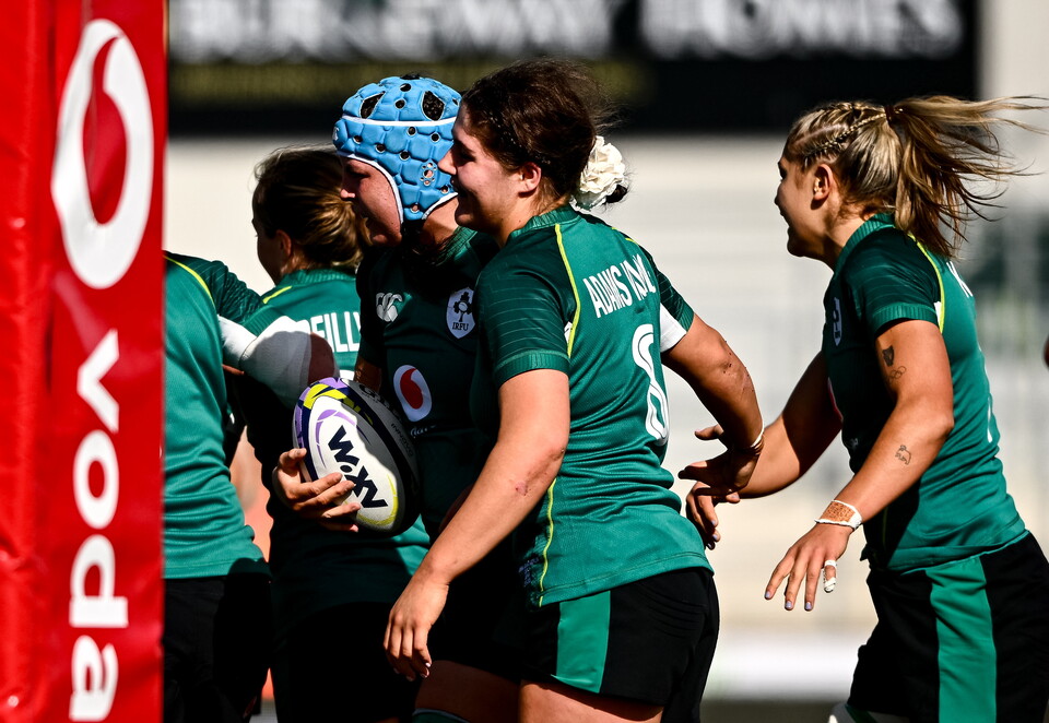 Brittany Hogan is congratulated after scoring against Japan