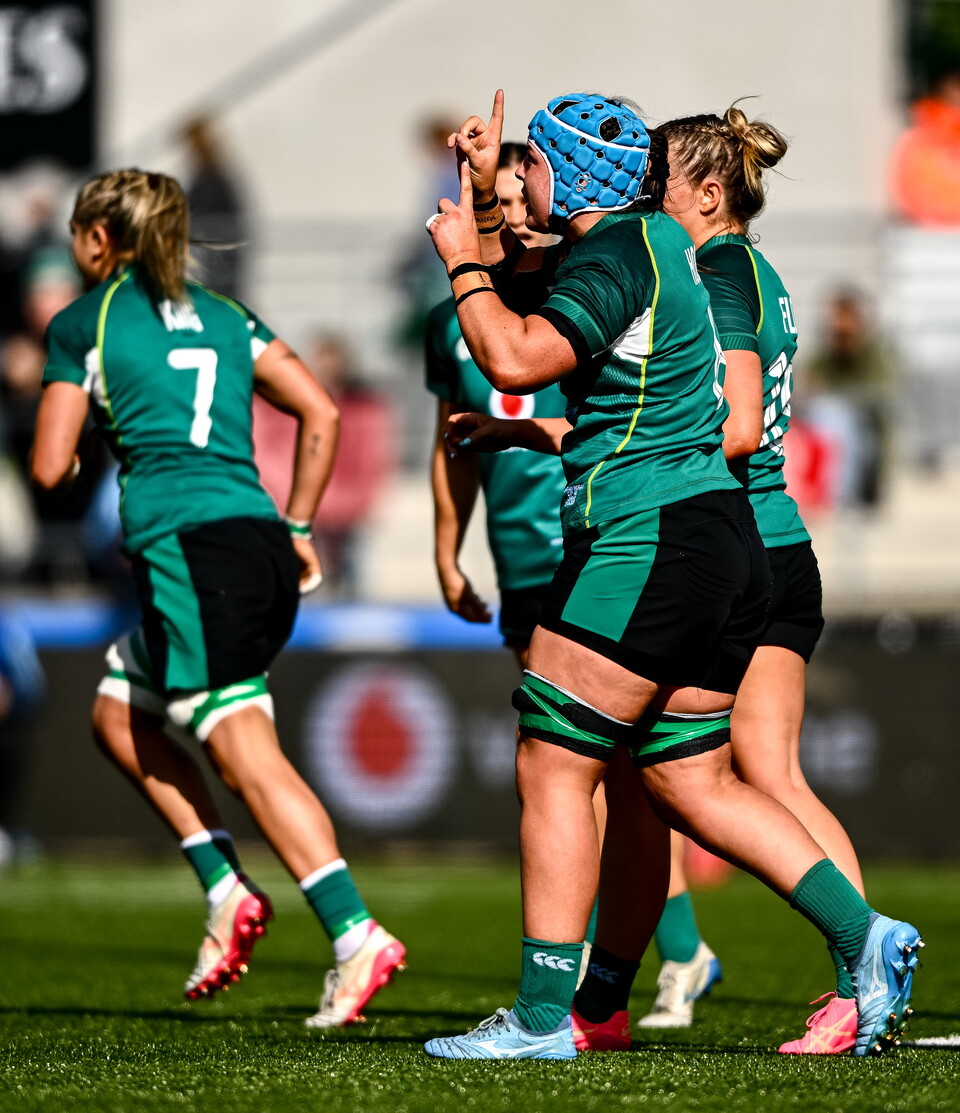 Brittany Hogan celebrates her first try against Japan