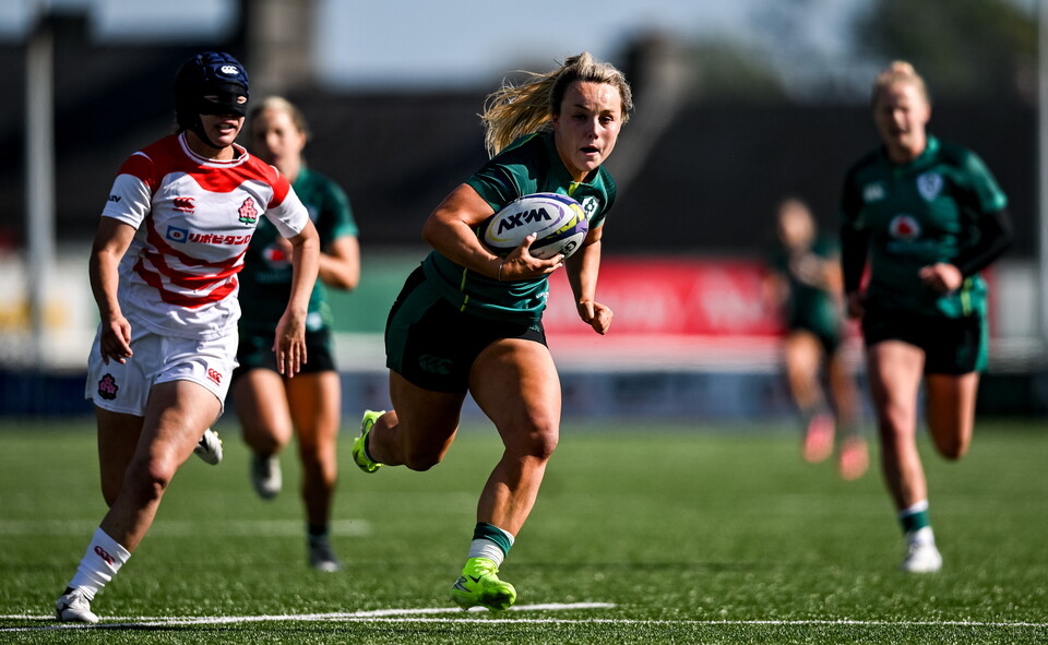 Aoife Dalton races clear to score against Japan