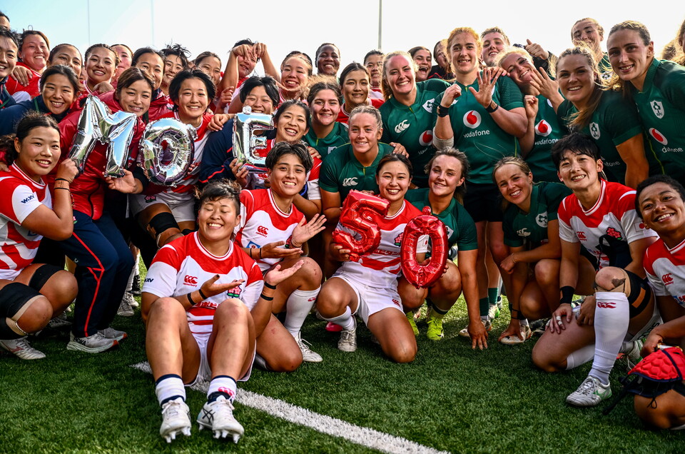The Ireland and Japan players celebrate Moe Tsukui's 50th cap
