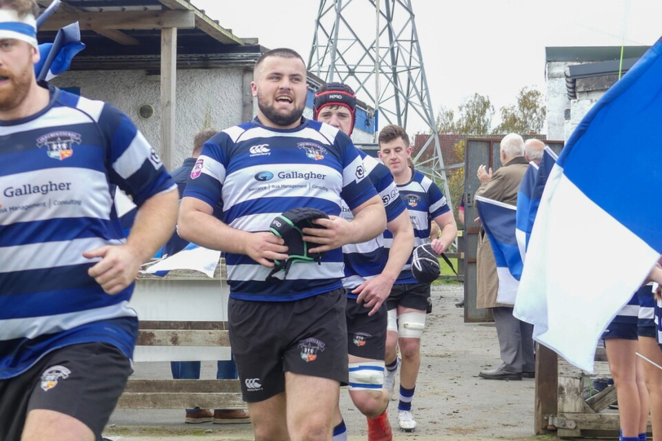 Joe Rickard running out onto the pitch