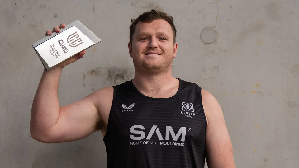 Ulster prop Angus Bell with his award