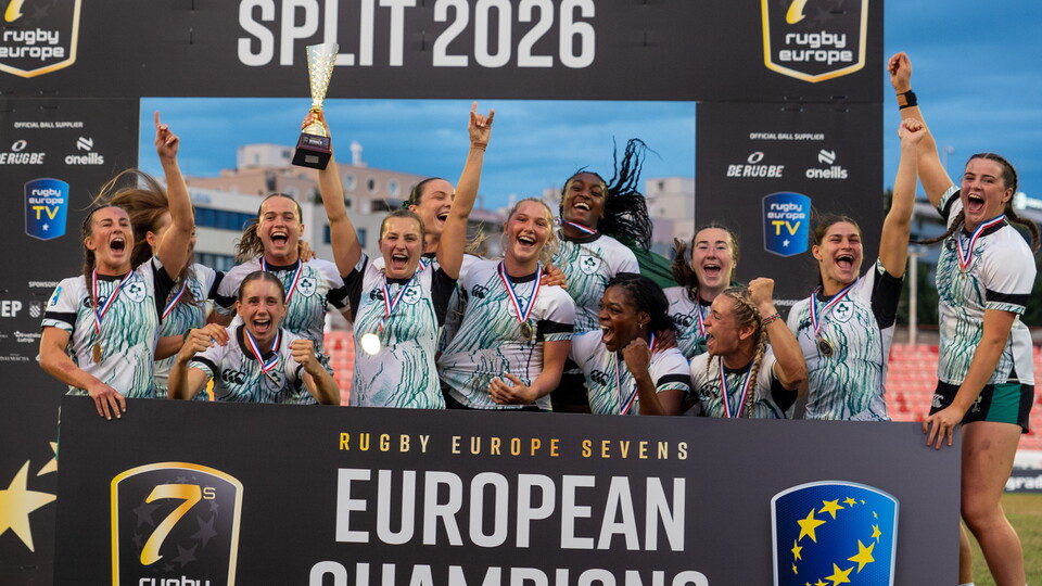 Megan Burns lifts the trophy as the Ireland Women celebrate in Split