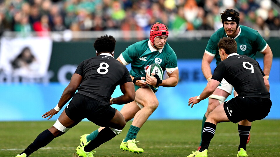 Josh van der Flier takes on the New Zealand defence