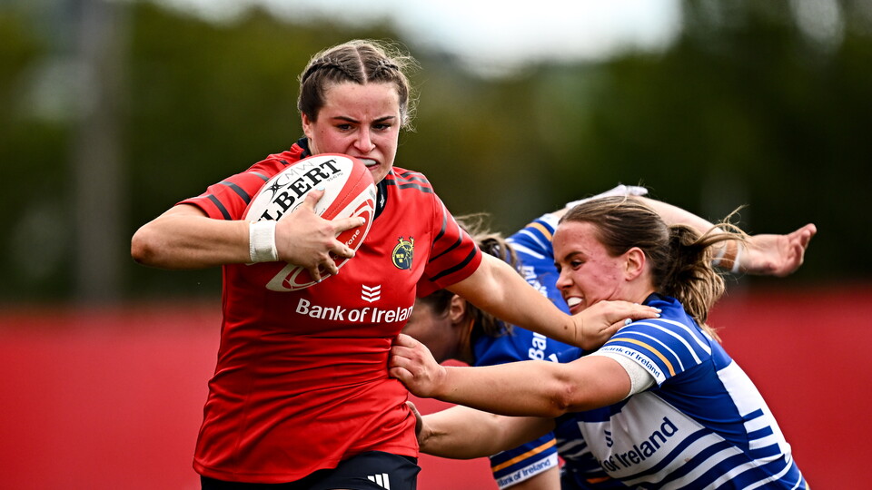Katie Corrigan gets past Eve Higgins and Robyn O'Connor to score for Munster
