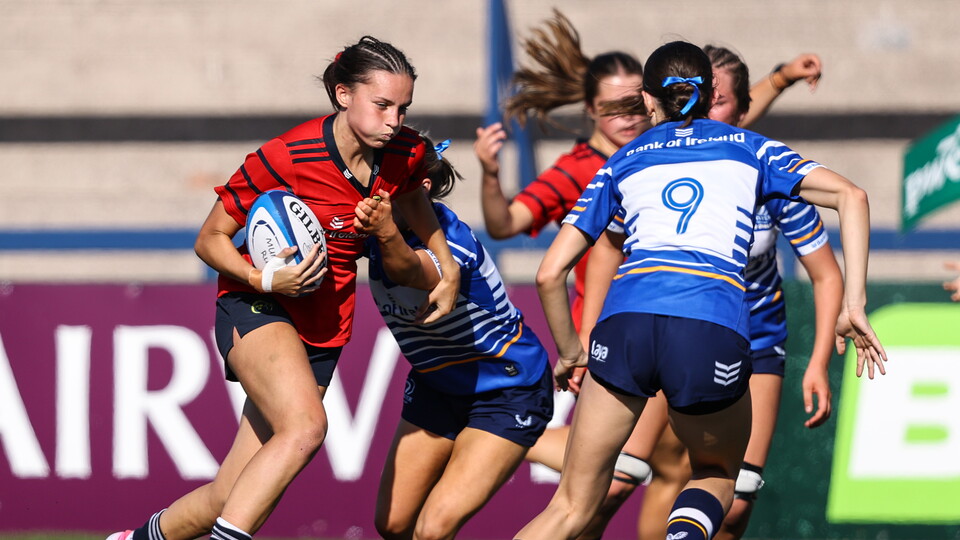 Munster U-18 out-half Eden Waters takes on the Leinster defence