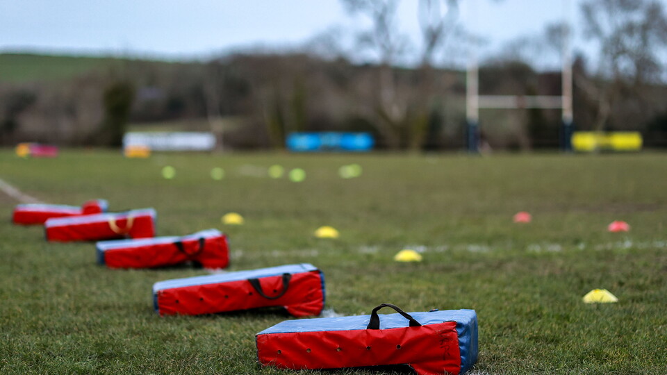Image of a rugby pitch with equipment