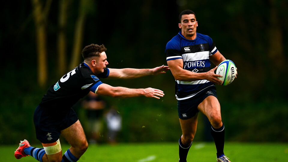 Wanderers' Jordan Conroy takes on Galway Corinthians full-back Harry Rogers