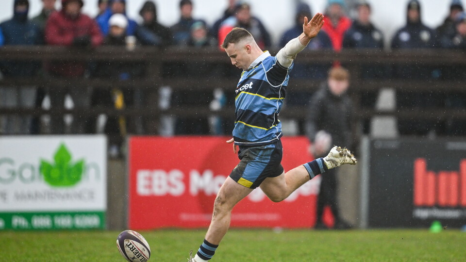 Jonny Hunter of Dromore RFC kicks  for goal