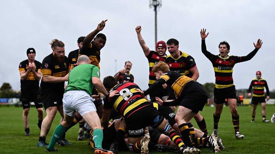 Sligo players celebrate their side's first try, scored by teammate Evin Ballentine