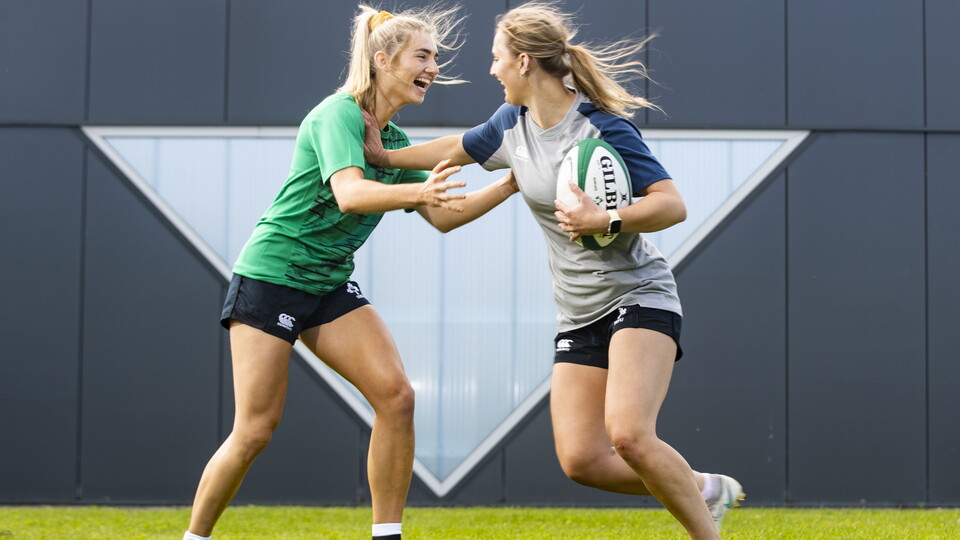 Image of two players having fun warming up