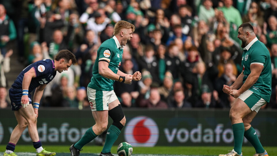 Two Irish Rugby players celebrate a win over Scotland