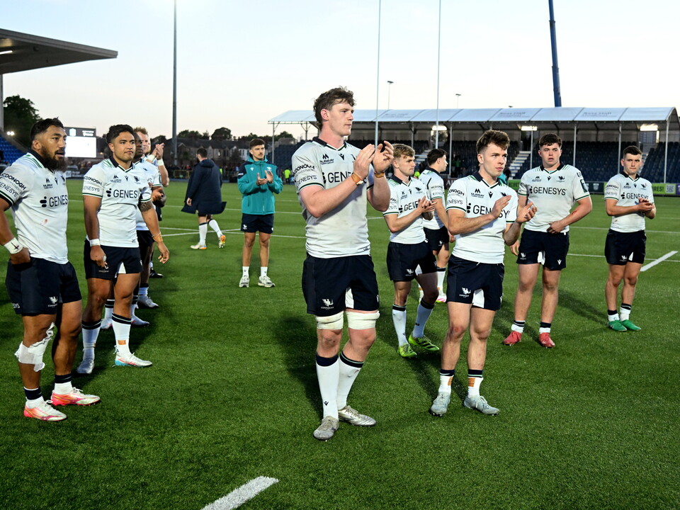 The Connacht players applaud the fans