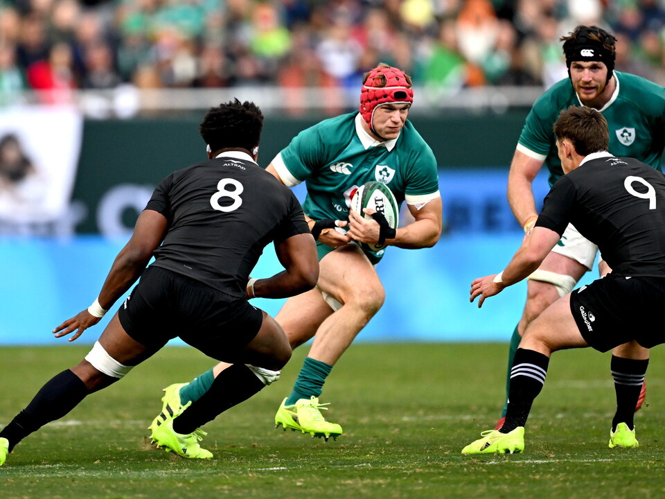 Josh van der Flier takes on the New Zealand defence