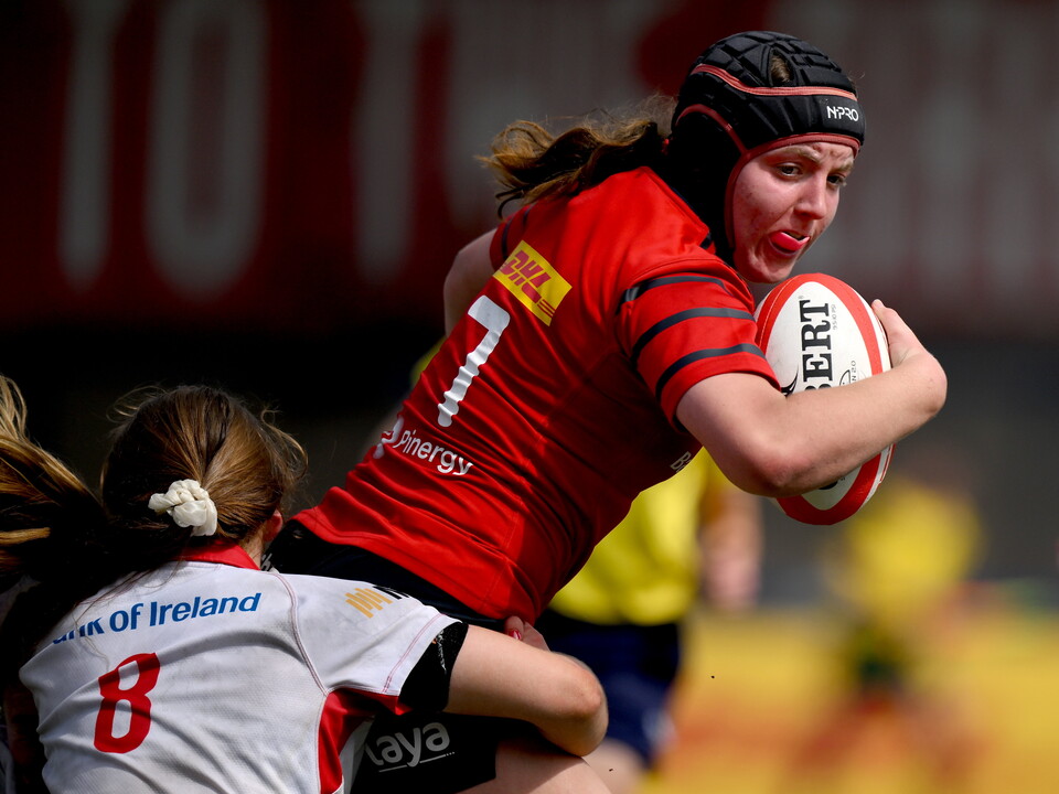 Munster's Sally Kelly takes on the Ulster defence