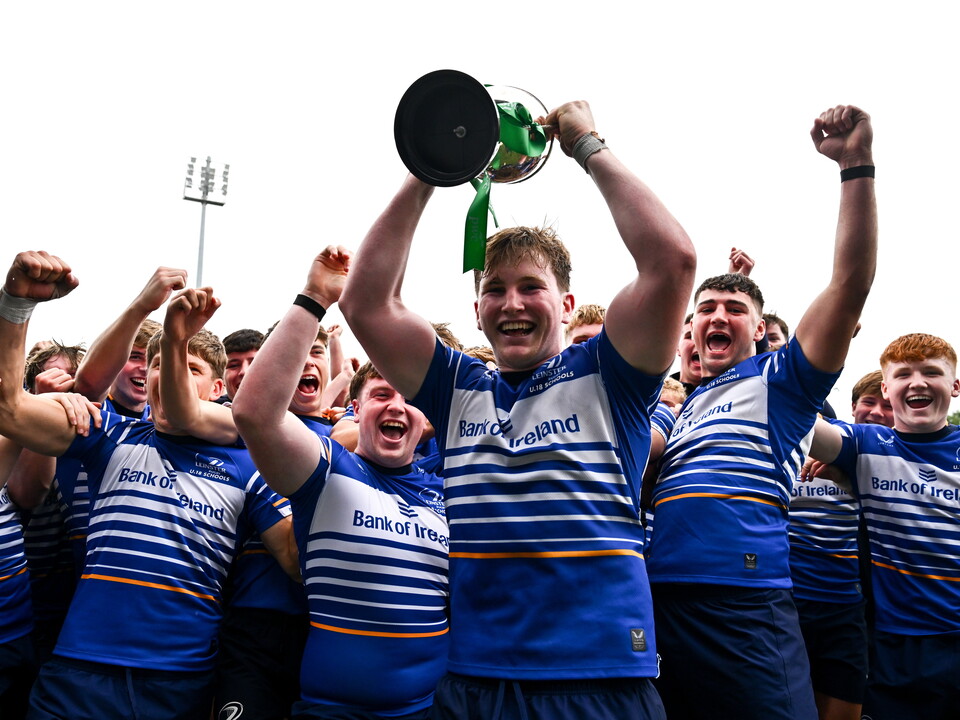 Leinster captain Hugh Keaney lifts the U-18 Schools Interprovincial trophy