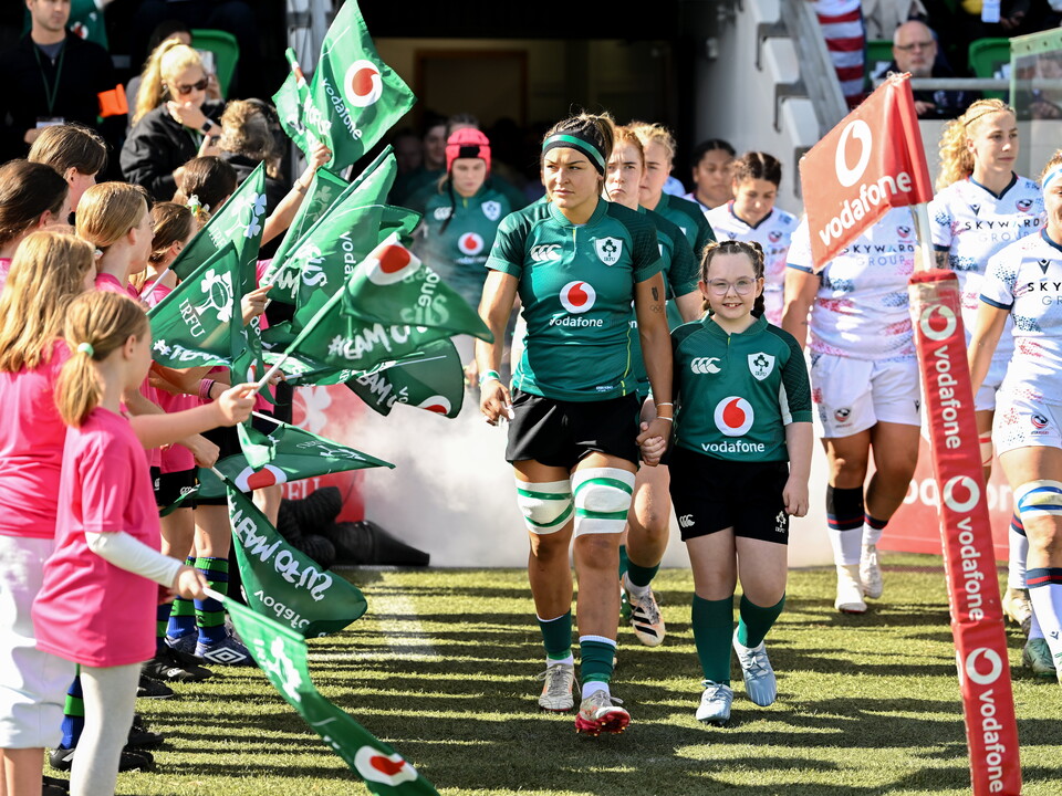 Erin King leads the Ireland team out in Tallaght